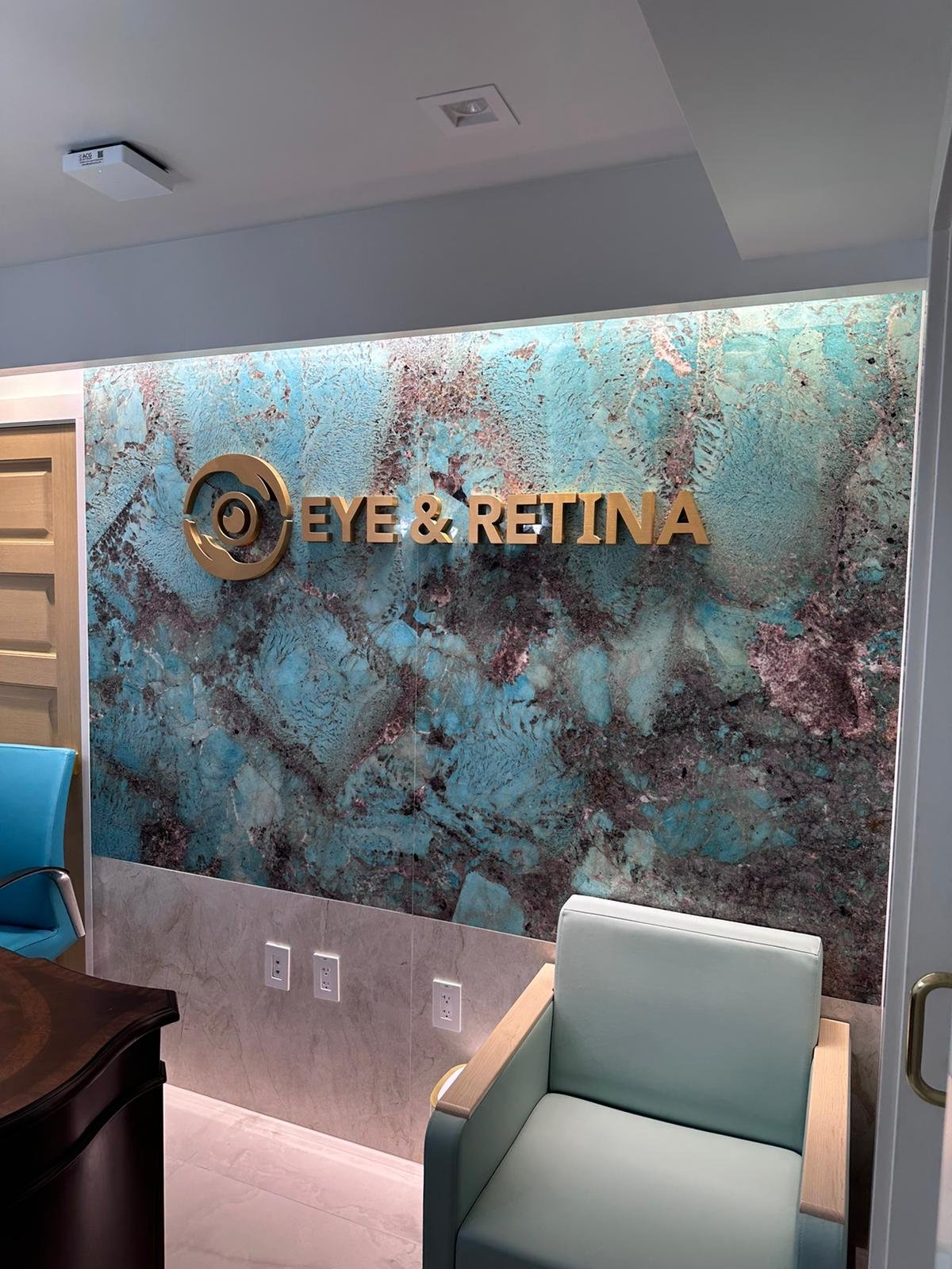 A large wall with the words eye & retina on it.