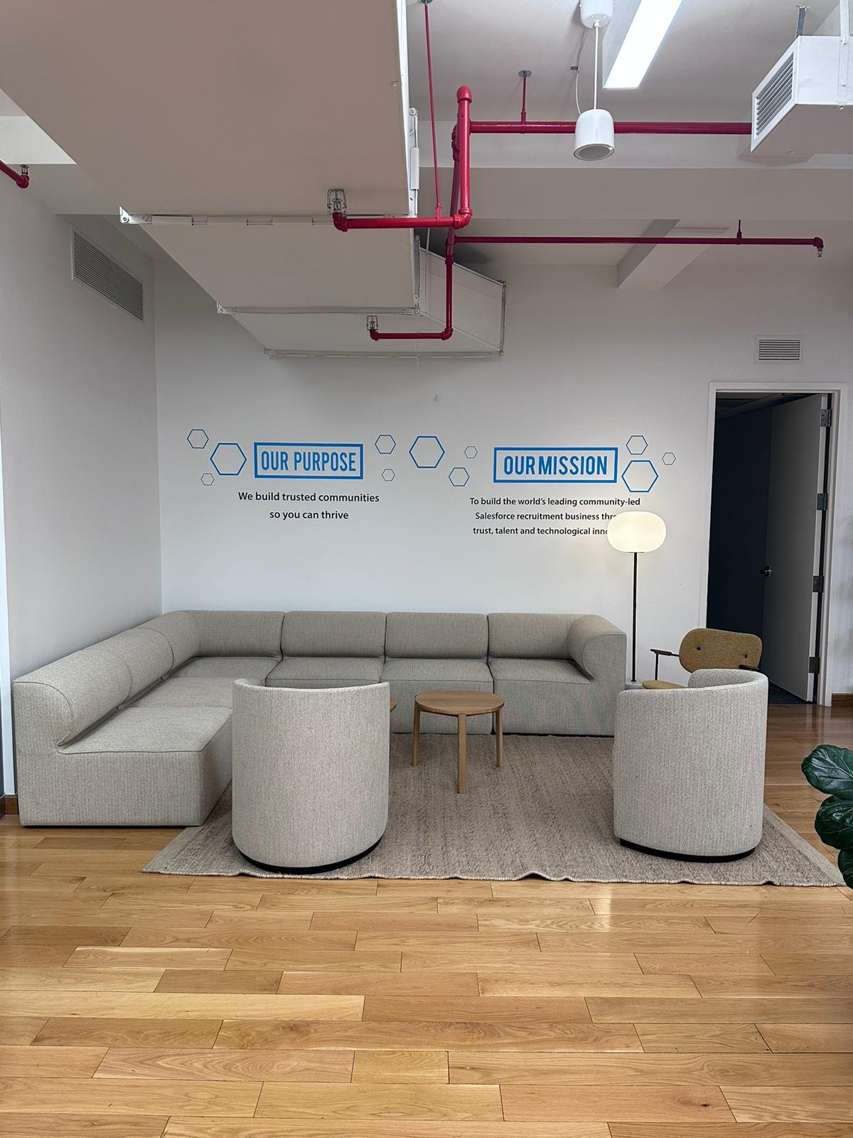 A room with couches and tables in it