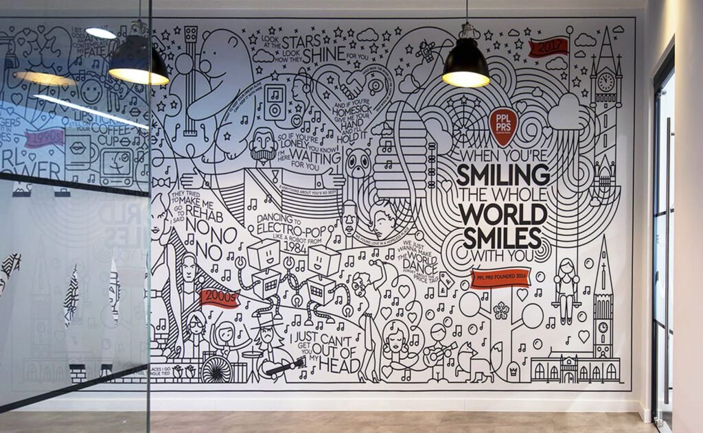 A wall with many different drawings on it